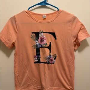 SHEIN Peach Short Sleeve Tee with Black Floral 'E' Graphic